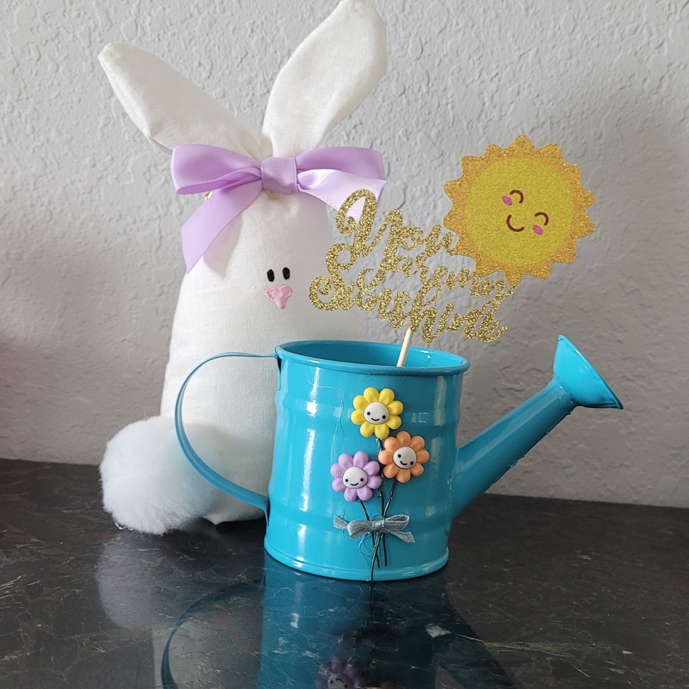 Blue Watering Can with Flowers and Bunny Decor